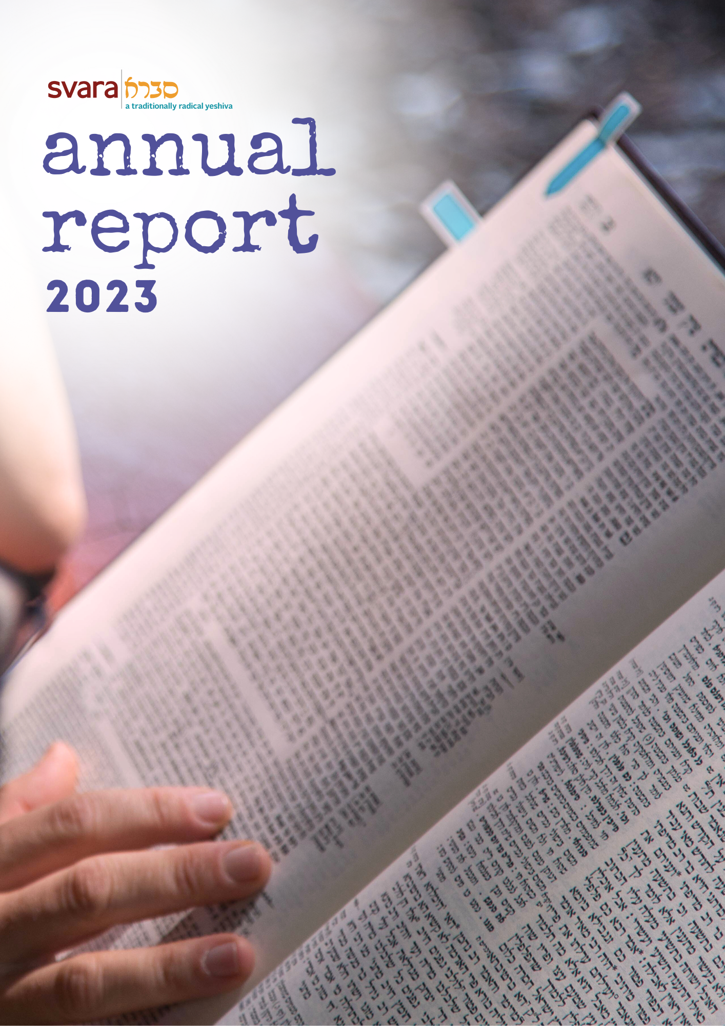 The cover page of SVARA's 2023 annual report. The image is a close-up of a masechet, which has two blue stickies on its pages. Someone's hand can be seen resting on the lower part of the daf.